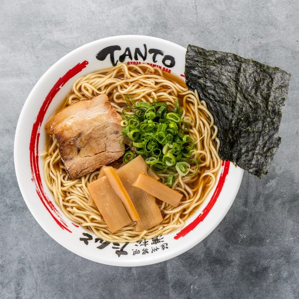 Tanto Gyoza and Ramen Bar's ramen bowl with pork, bamboo shoots, green onions, and nori.