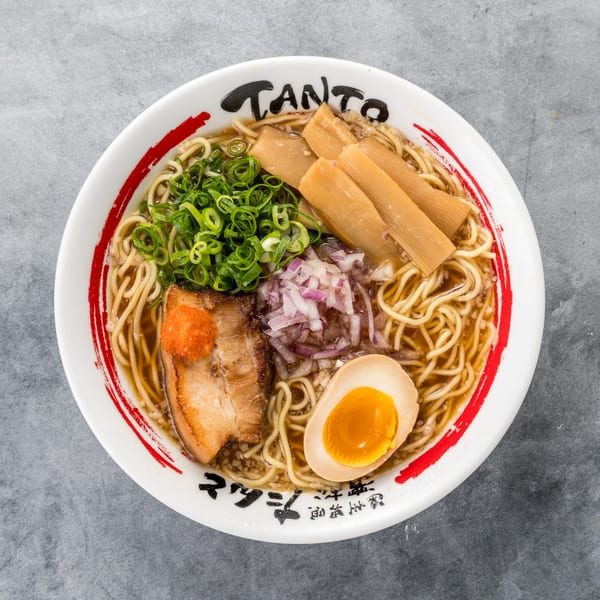 Tanto Gyoza and Ramen Bar's ramen bowl with pork, egg, bamboo shoots, and green onions.
