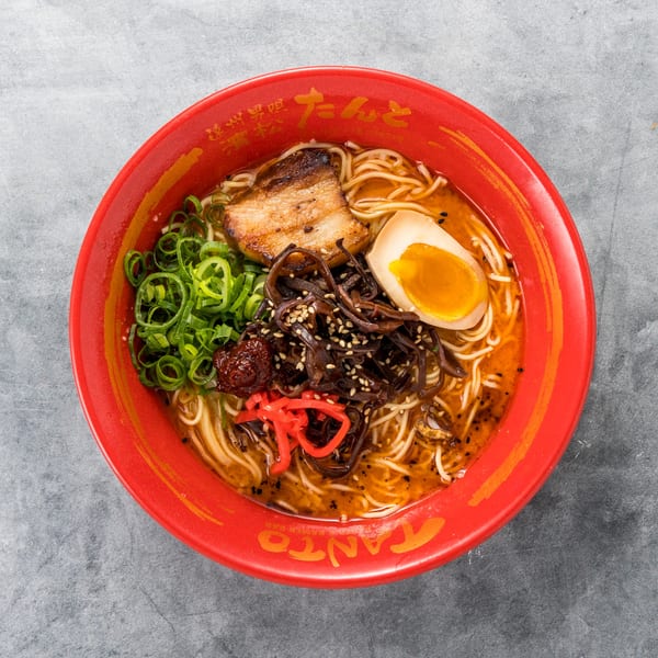 Tanto Gyoza and Ramen Bar's ramen bowl with pork belly, egg, green onions, and mushrooms.