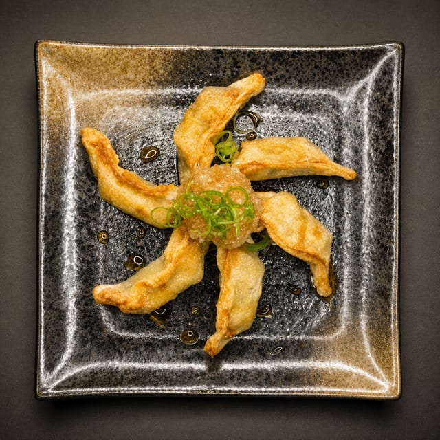 G. Grated Daikon & Ponzu Gyoza.